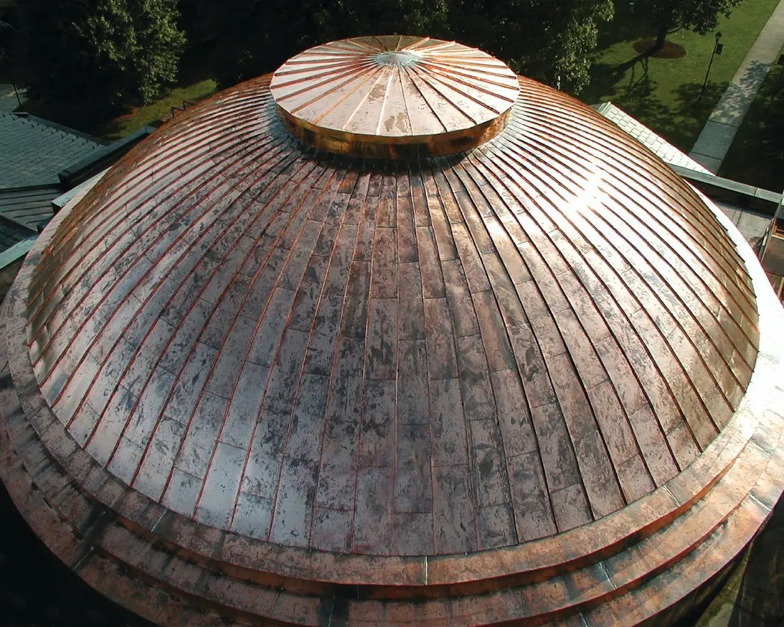 Craftsman Roofing crew installing a new roof in Poquott